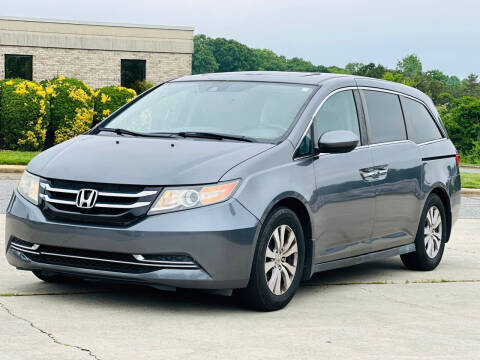 2015 Honda Odyssey for sale at Triple A's Motors in Greensboro NC