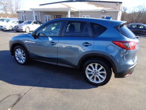 2015 Mazda CX-5 for sale at BETTER BUYS AUTO INC in East Windsor CT