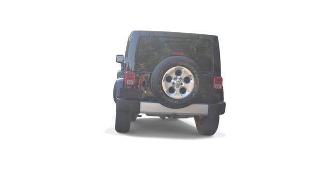 2014 Jeep Wrangler Unlimited for sale at Bowman Auto Center in Clarkston, MI