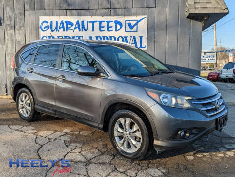 2012 Honda CR-V for sale at Heely's Autos in Lexington MI