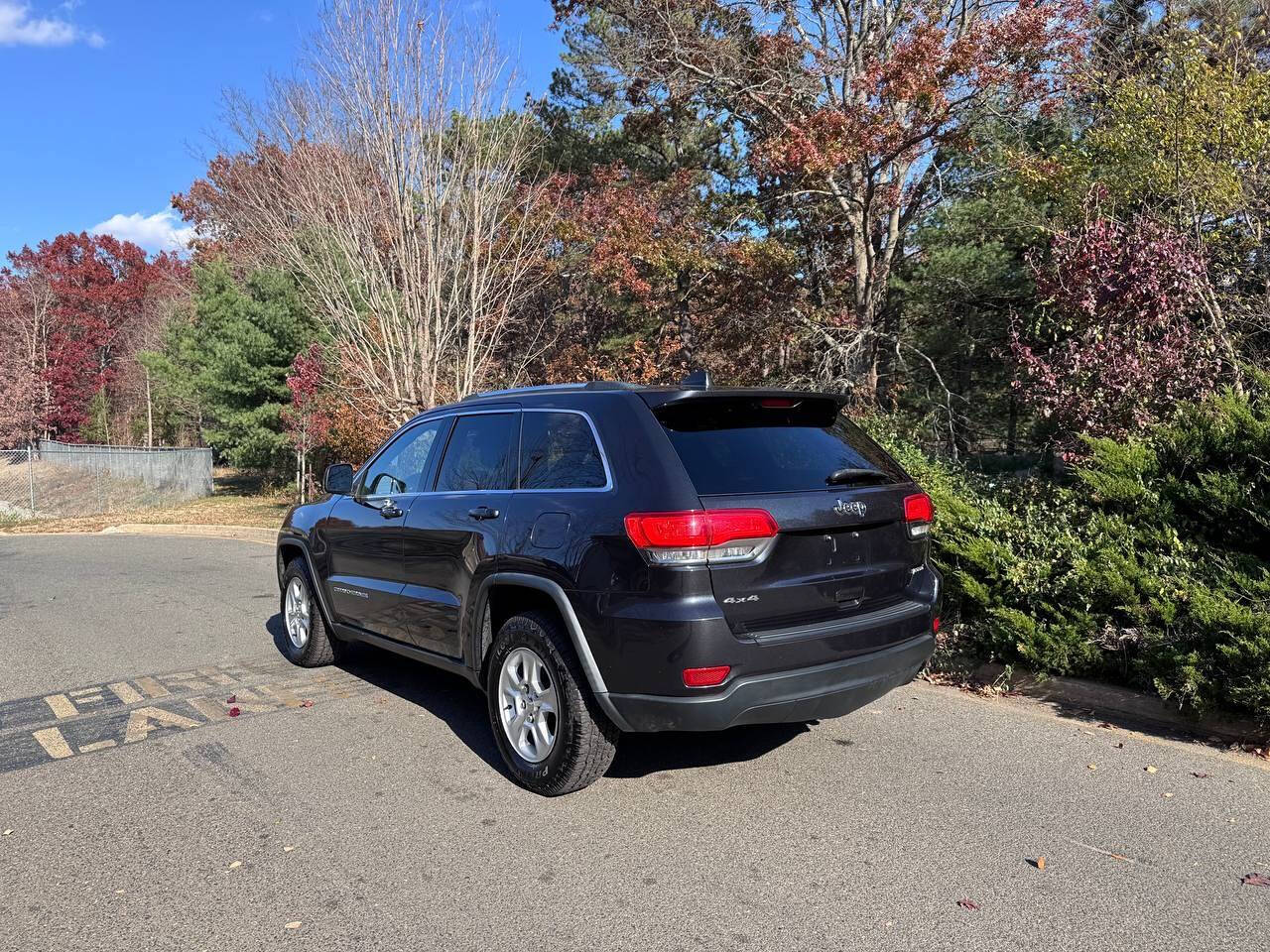 2014 Jeep Grand Cherokee for sale at Paragon Auto Group in Toms River, NJ