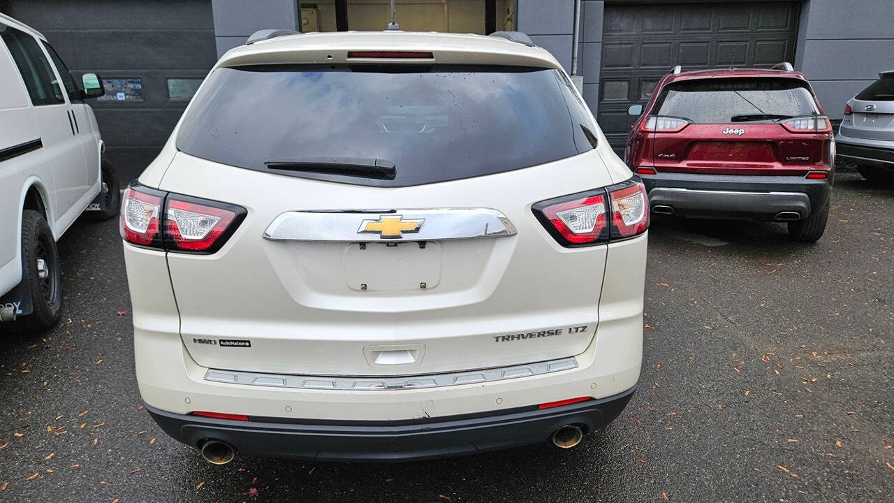 2014 Chevrolet Traverse for sale at RENOS AUTO SALES LLC in Waterbury, CT