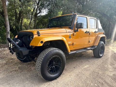 2014 Jeep Wrangler Unlimited for sale at Race Auto Sales in San Antonio TX