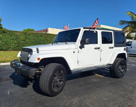 2013 Jeep Wrangler Unlimited for sale at BETHEL AUTO DEALER, INC in Miami FL