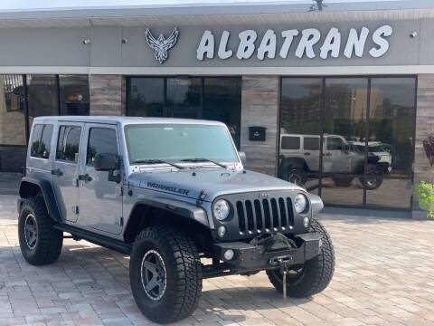 2016 Jeep Wrangler Unlimited for sale at Albatrans Car & Truck Sales in Jacksonville FL