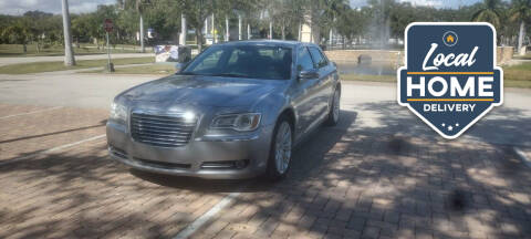 2013 Chrysler 300 for sale at Megs Cars LLC in Fort Pierce FL
