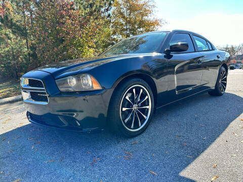 2013 Dodge Charger for sale at LA 12 Motors in Durham NC