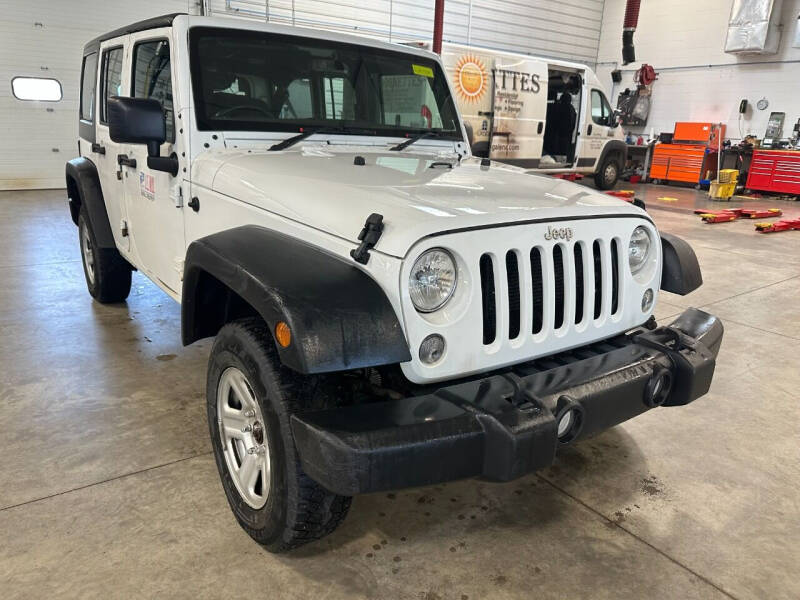 2017 Jeep Wrangler Unlimited for sale at Postal Pete in Galena IL