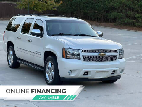 2011 Chevrolet Suburban for sale at Two Brothers Auto Sales in Loganville GA