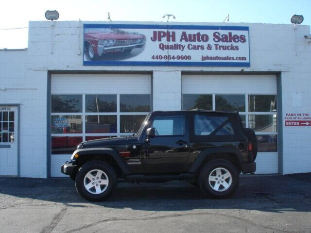 2011 Jeep Wrangler for sale at JPH Auto Sales in Eastlake OH
