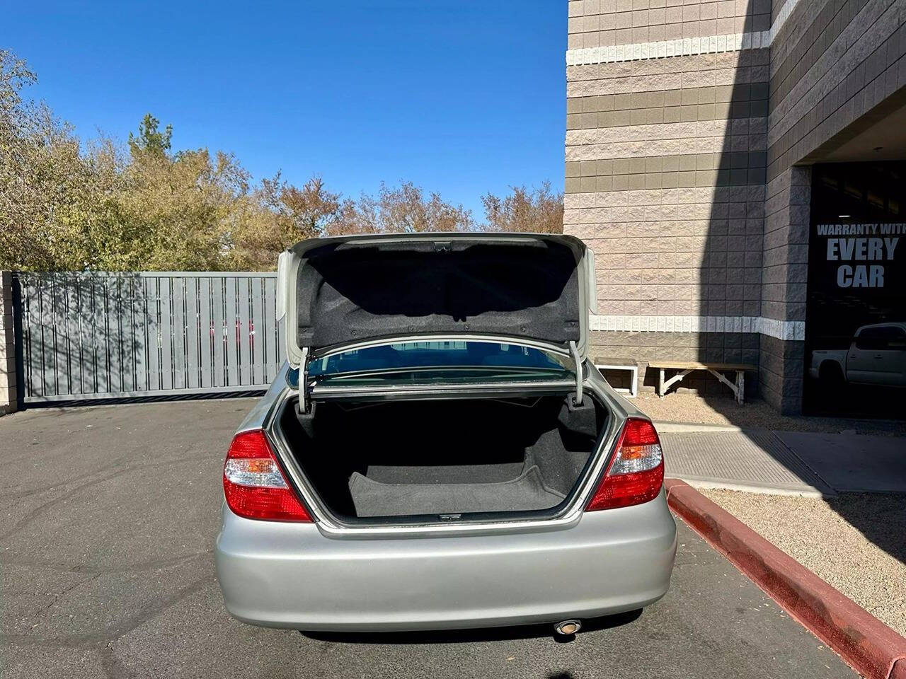 2003 Toyota Camry for sale at HUDSONS AUTOS in Gilbert, AZ