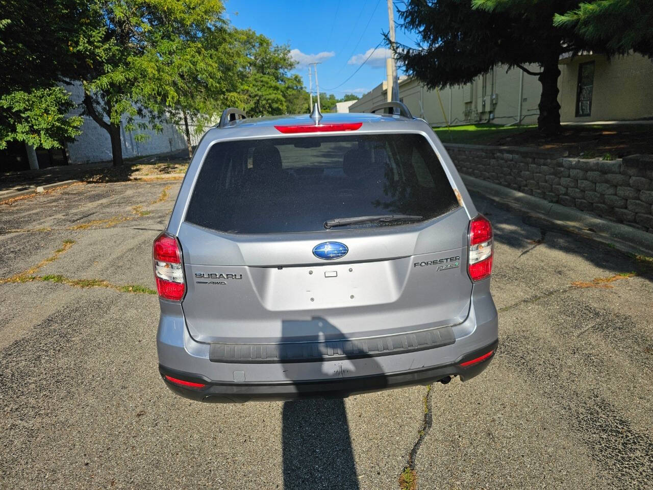 2010 Subaru Forester for sale at WAGNER AUTO MART LLC in Ann Arbor, MI