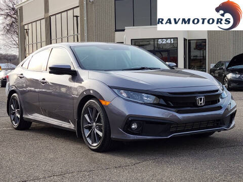 2021 Honda Civic for sale at RAVMOTORS - CRYSTAL in Crystal MN