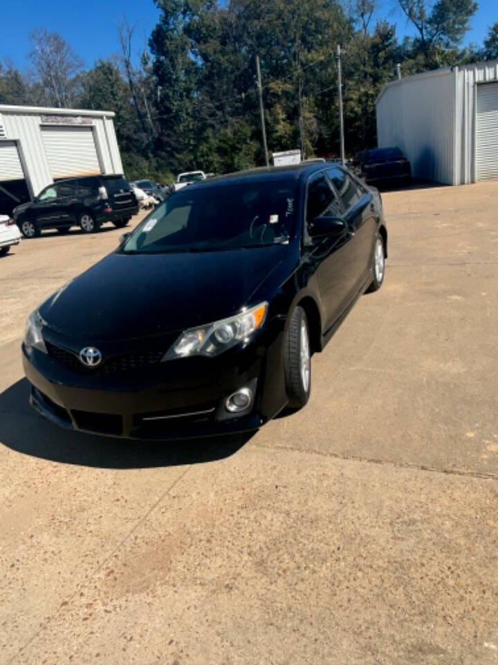 2013 Toyota Camry for sale at Good Cars and Trucks Wholesale, LLC in Crystal Springs, MS