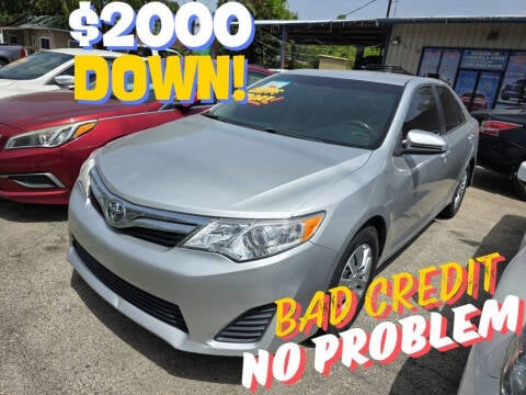 2014 Toyota Camry for sale at Foremost Auto Sales in Houston TX