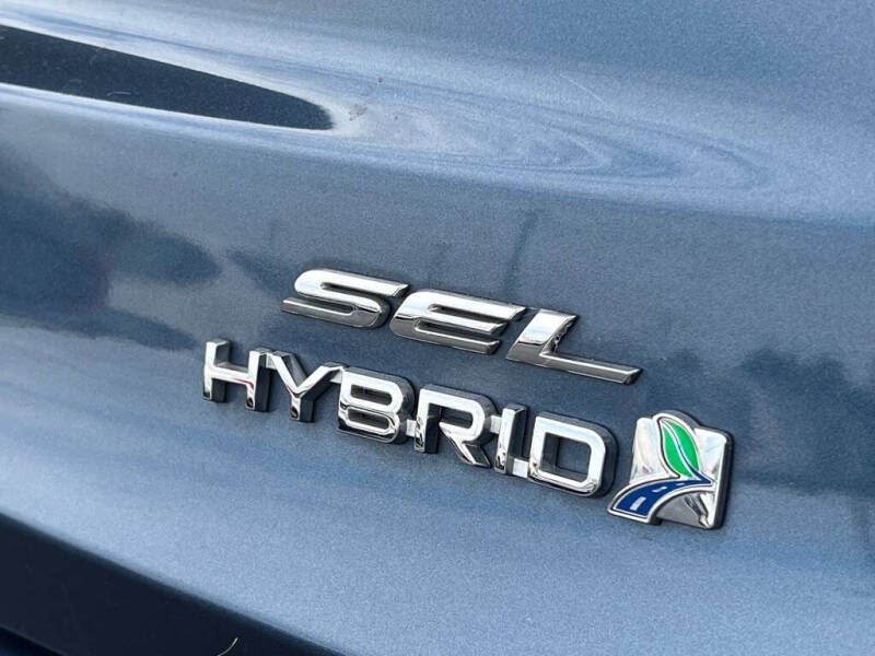 Used 2019 Ford Fusion Hybrid SEL with VIN 3FA6P0MU0KR255999 for sale in Wood River, IL