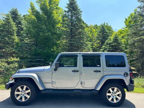 2013 Jeep Wrangler Unlimited for sale at KT Automotive in West Olive MI