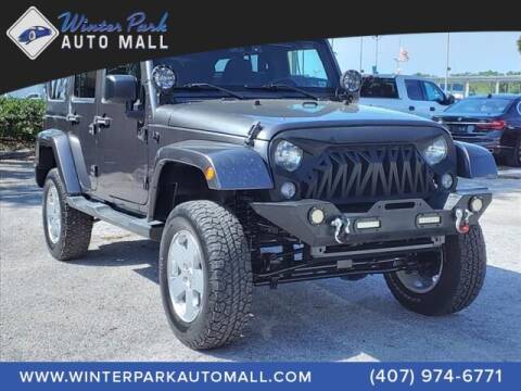 2014 Jeep Wrangler Unlimited for sale at Winter Park Auto Mall in Orlando FL