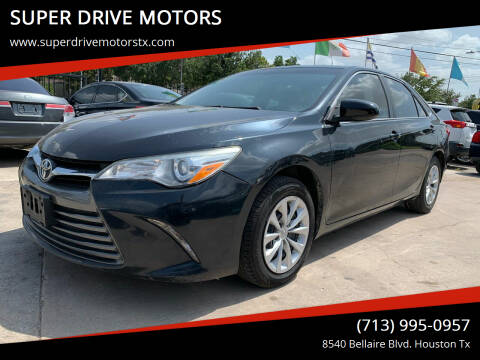 2015 Toyota Camry for sale at SUPER DRIVE MOTORS in Houston TX