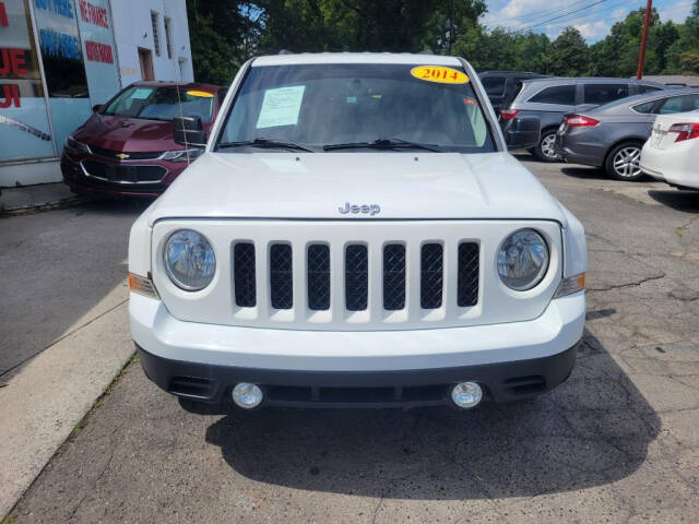 2014 Jeep Patriot for sale at DAGO'S AUTO SALES LLC in Dalton, GA