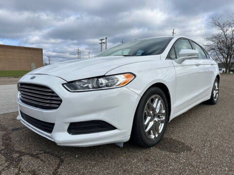 2015 Ford Fusion for sale at Minnix Auto Sales LLC in Cuyahoga Falls OH