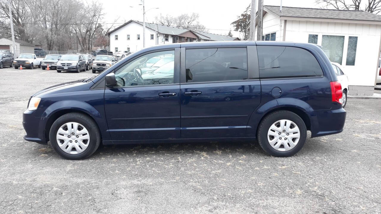 2014 Dodge Grand Caravan for sale at CHRISTIAN AUTO SALES in Anoka, MN