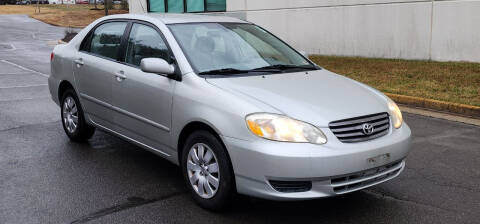 2004 Toyota Corolla for sale at BOOST MOTORS LLC in Sterling VA