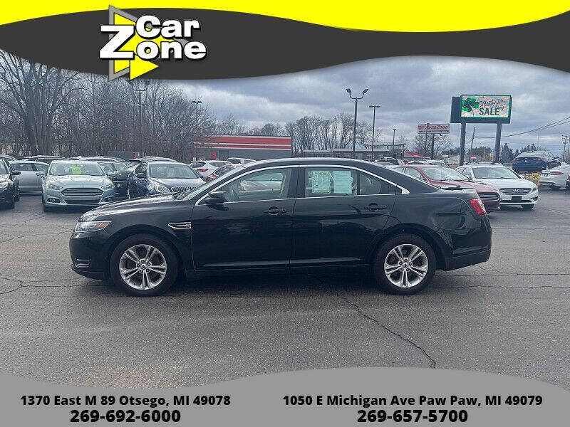 2016 Ford Taurus for sale at Car Zone in Otsego MI