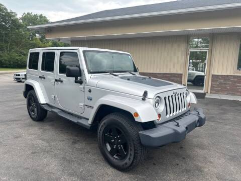 2012 Jeep Wrangler Unlimited for sale at RPM Auto Sales in Mogadore OH