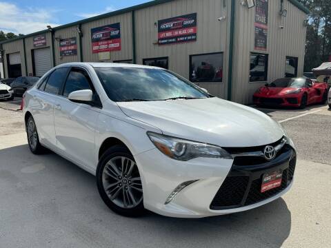 2016 Toyota Camry for sale at Premium Auto Group in Humble TX