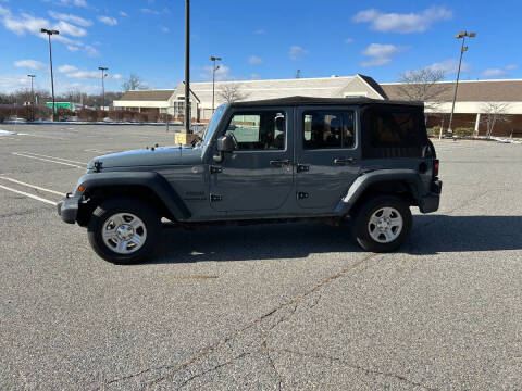 2015 Jeep Wrangler Unlimited for sale at BORGES AUTO CENTER, INC. in Taunton MA
