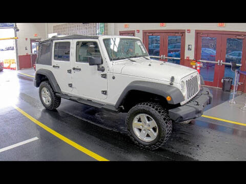 2010 Jeep Wrangler Unlimited for sale at Automania in Dearborn Heights MI