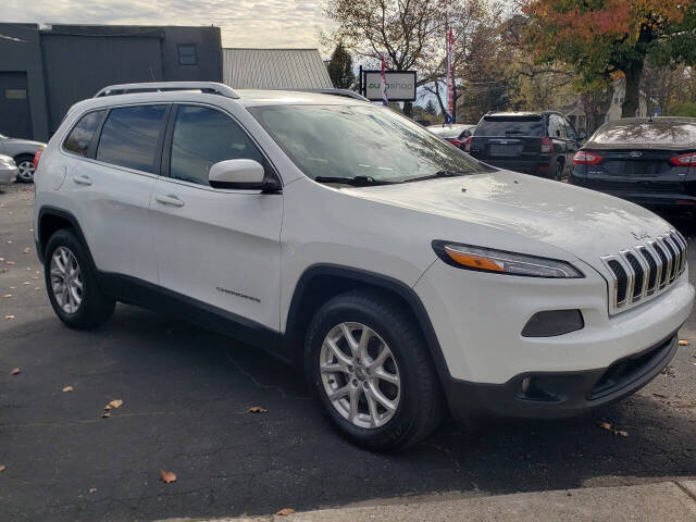 2015 Jeep Cherokee for sale at Auto Shop in Wyoming, MI