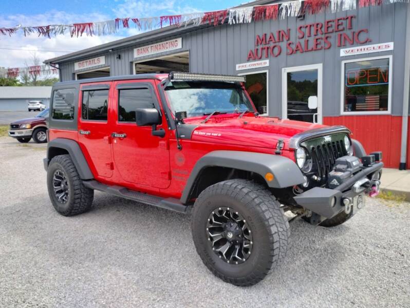 2016 Jeep Wrangler Unlimited for sale at MAIN STREET AUTO SALES INC in Austin IN
