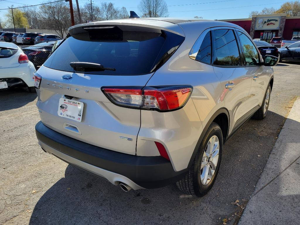 2020 Ford Escape for sale at DAGO'S AUTO SALES LLC in Dalton, GA