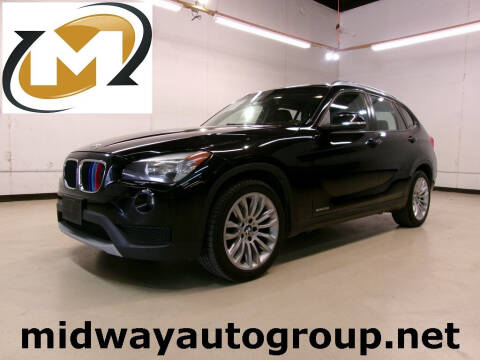 2014 BMW X1 for sale at Midway Auto Group in Addison TX