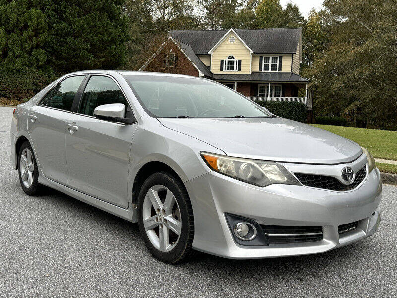 2012 Toyota Camry for sale at SHURE AUTO SALES in Snellville, GA