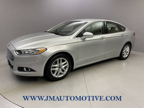 2013 Ford Fusion for sale at J & M Automotive in Naugatuck CT