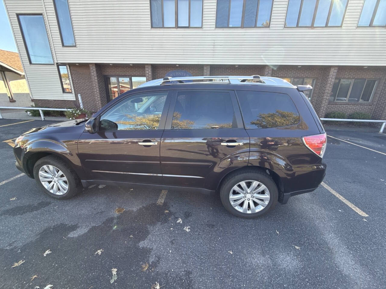 2013 Subaru Forester for sale at Rochester Imports LLC in Webster, NY