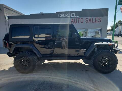 2011 Jeep Wrangler Unlimited for sale at CHURCHILL AUTO SALES in Fallon NV