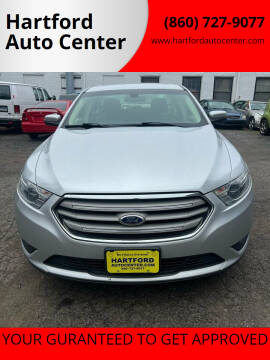 2013 Ford Taurus for sale at Hartford Auto Center in Hartford CT