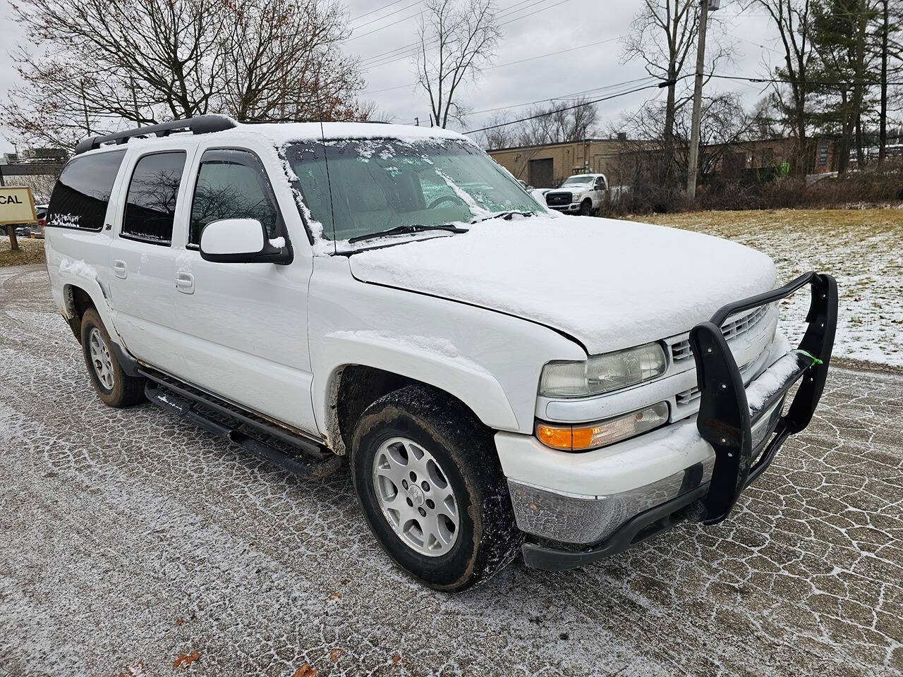 2003 Chevrolet Suburban for sale at WAGNER AUTO MART LLC in Ann Arbor, MI