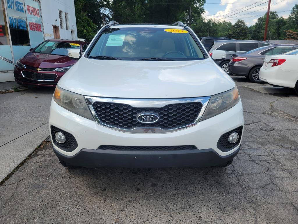 2011 Kia Sorento for sale at DAGO'S AUTO SALES LLC in Dalton, GA