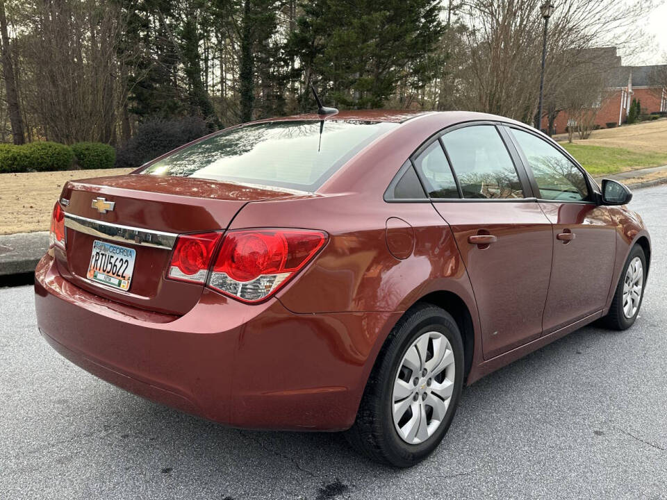 2013 Chevrolet Cruze for sale at SHURE AUTO SALES in Snellville, GA