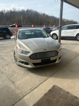 2015 Ford Fusion for sale at LEE'S USED CARS INC ASHLAND in Ashland KY