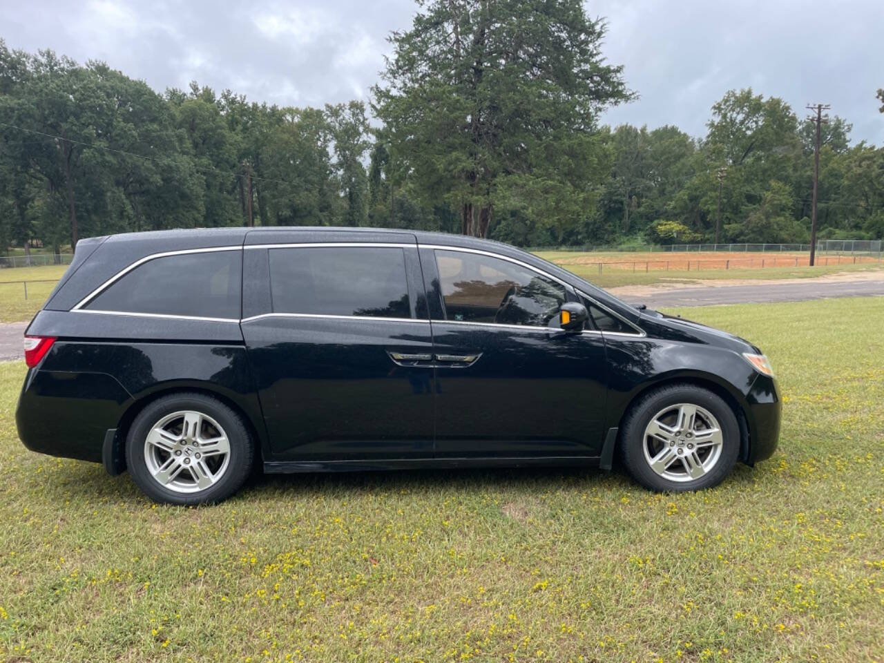 2011 Honda Odyssey for sale at Russell Brothers Auto Sales in Tyler, TX