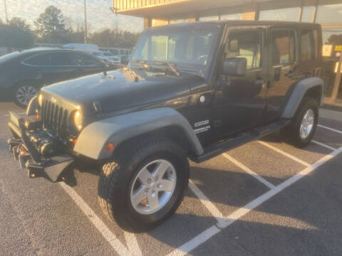 2010 Jeep Wrangler Unlimited for sale at Greenville Auto World in Greenville NC