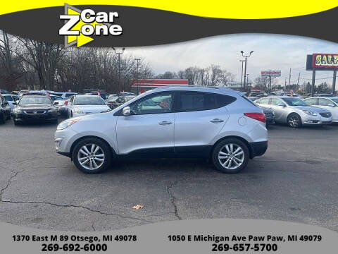 2010 Hyundai Tucson for sale at Car Zone in Otsego MI