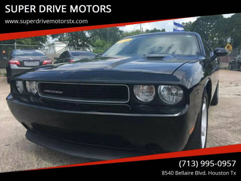 2014 Dodge Challenger for sale at SUPER DRIVE MOTORS in Houston TX