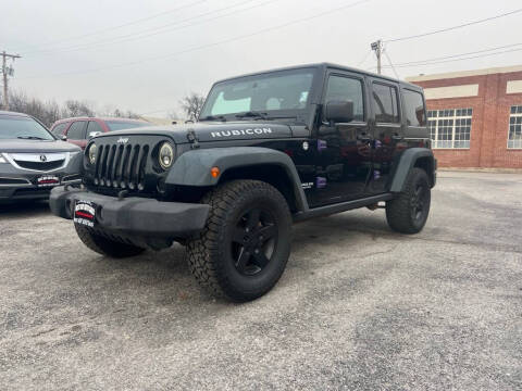 2013 Jeep Wrangler Unlimited for sale at BEST BUY AUTO SALES LLC in Ardmore OK